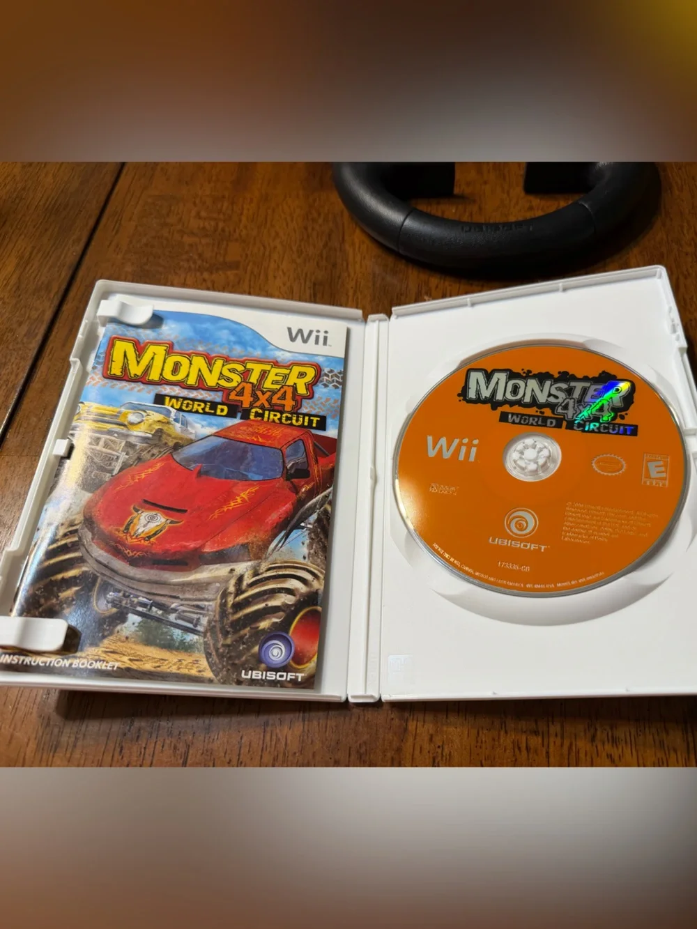 Wii Monster 4x4: World‎ Circuit (Wii) - Black Ubisoft Steering Wheel Included